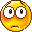 Pixelated yellow-orange circular face with white eyes and brown pupils, displaying multiple expressions across a