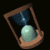 Animated hourglass with light blue sand in a brown wooden frame, showing sequential flow from top to bottom