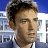 A pixelated image showing a person's face on the left and blue text reading 'jersey girl' on the right, with visible dithering and low-resolution artifacts.