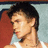 A four- shows a person in a white tank top against red and blue backgrounds with pixelated text overlays