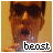 A pixelated image of a person wearing dark sunglasses with the word 'beast' displayed in white text at the bottom, set against a light brown background.