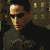 nine identical pixelated images showing a person with dark hair and sunglasses against a building background, one frame missing