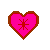 A static contact sheet showing two frames of a pixel art icon: left frame is a pink heart with brown border and red starburst, right frame displays green text on dark background.