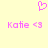 Pixelated pink heart symbol above two identical text strings reading 'Katie <3' on a pale yellow background.