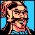 Pixelated static image of a character with long hair, glasses, and a blue outfit against a solid light blue background.