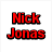 Red pixelated text reads 'Nick Jonas is sooo HOT!' above a low-resolution photo of a person with curly hair on a textured background.