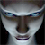 Pixelated close-up of a humanoid face with pale skin, blue eyes, and a neutral expression against a dark background.