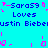 Pixelated cyan background with repeated blue text 'Sara59 Loves Justin Bieber' and pink decorative elements.
