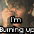 A split-screen image with a man on the left and two people in formal attire on the right, overlaid with text reading "I'm Burning up for you Lena!".