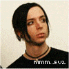 A four- shows a person with black hair and a choker necklace, alongside a skeletal figure and a spider web design; the lower-left 's text changes from 'MMM...E VIL' to 'MMM...EVIL'