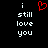 A black background displays white text reading "i still love you" with a red pixelated heart symbol above the word "still".