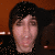 Pixelated image of a person with dark hair and light skin, overlaid on large black text reading 'oh em gee!' against white background.