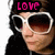 Pixelated image of a person wearing large white-framed sunglasses and dark clothing with pink text above the head.