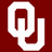 A static image shows three white 'OU' monograms on a dark red background with one gray square in the bottom right corner.