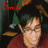 A pixelated image of a person with dark hair wearing glasses and a red top, with green and brown background elements.