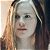 Static 50x50 pixel buddy icon showing a close-up of a person with light skin, long brown hair, and dark eyes against a gradient background.