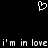 Pixelated white heart symbol above repeated text 'i'm in love i'm in love' on black background.