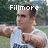 Pixelated image of a person in athletic attire with arms extended, overlaid text reading 'Fillmore', and blurred green background.