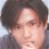 Four pixelated headshots of a person with dark hair in varying poses and backgrounds, displayed in a