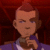 Pixelated image of a person with short brown hair wearing a purple shirt against a dark red background.