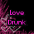 Pixelated text 'Love Drunk' in bright magenta on black background with abstract pink and purple pixel art elements.