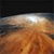 A pixelated image with a dark upper section and a lower section featuring warm orange and brown tones, with a bright white light source near the top center.