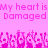 Pixelated pink text reads 'My heart is Damaged' repeated twice on a solid pink background with pixelated floral shapes below.