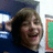 A pixelated image shows a person in a blue cap and gown smiling, with a black text displaying 'i love you josh <3 9.30.07 :)' in white pixelated font