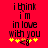 Red background with black text reading 'i think i'm in love with you' and yellow pixelated hearts, where the central heart changes from orange to yellow between frames.