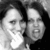 Two pixelated faces in grayscale, side-by-side with overlapping features and a dark background.