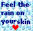 Pixelated text reads 'Feel the rain on your skin' with a red heart symbol below, set against a light blue and white pixelated background.