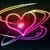 Animated heart-shaped icon with glowing pink center and swirling multicolored ribbons on dark background.