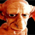 Pixelated close-up of a character with orange hair and a white face, showing a neutral expression against a black background.