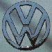 A circular blue and gray icon with a stylized 'W' or 'M' symbol inside, displayed in multiple variations across a
