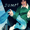 Pixelated image of a person in mid-air with arms outstretched, wearing a green sweater and blue jeans, with 'JUMP!' text above.