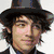 Six distinct pixelated portraits of a young man with dark hair in various outfits and backgrounds.