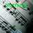 Pixelated grayscale image of musical notation with green text reading 'Nothing beats band!' across four
