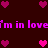 Pixelated pink hearts and repeated 'i'm in love' text on a dark red background with animated heart placement changes.