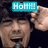 A person with dark hair sings into a microphone, wearing a dark shirt, with a cyan 'HoH!' text box in the top-left corner.