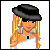Animated contact sheet of a pixel-art character with blonde hair, black beret, and orange-and-white outfit performing sequential movements including leg poses and bag adjustments.