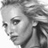 Black-and-white pixelated icon of a person's face in profile view with visible hair, eye, nose, and mouth details on a transparent background.
