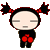 Pixelated character with black pigtails and red accents, standing with closed eyes and red boxing gloves, displayed in a