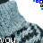 A static image of a textured gray boot with blue pixel accents, overlaid with fragmented text phrases and two light blue 'M' symbols at the bottom right.