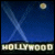 Animated sequence showing a blue night sky with white light trails forming an X, a yellow moon, and the word HOLLYWOOD in block letters on a black strip.