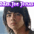 Pixelated static image of a person with dark hair and a purple banner reading 'Mr. Joe Jonas' above the head.