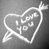 A white chalk-style heart with an arrow piercing it, containing the text "I LOVE YOU" in a handwritten font on a dark gray background.