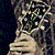 Two identical pixelated figures with dark hair and light skin hold up thumbs in a static pose against a black background.