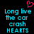 Pixelated cyan text reads "Long live the car crash HEARTS" on black background with pink heart symbol above.