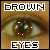 Brown eyes with pixelated text 'BROWN' above and 'EYES' below, showing subtle animation changes in the eye's reflection points.