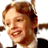 Two side-by-side animated frames of a person with curly brown hair in a pixelated style, showing different facial expressions and slight head movements against a white background.